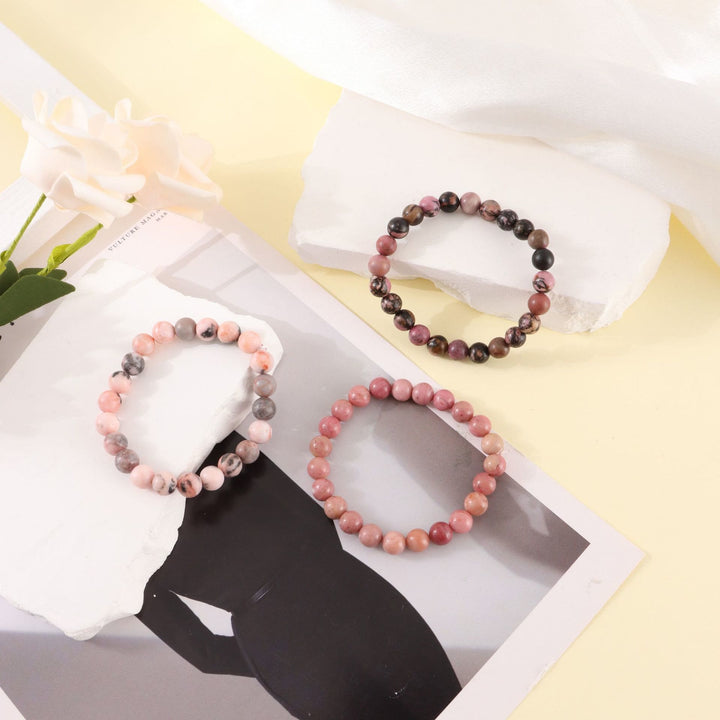 Bracelet de perles fait main en pierre zébrée rose rhodochrosite Olivenorma de 8 mm