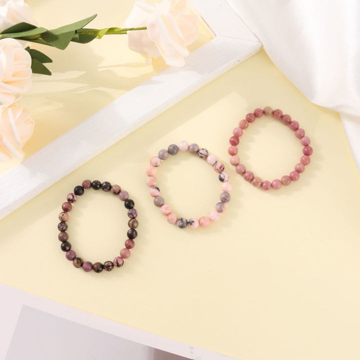 Bracelet de perles fait main en pierre zébrée rose rhodochrosite Olivenorma de 8 mm