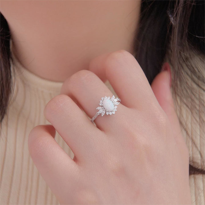 Bague en argent 925 avec motif tournesol et opale blanche et bleue Olivenorma