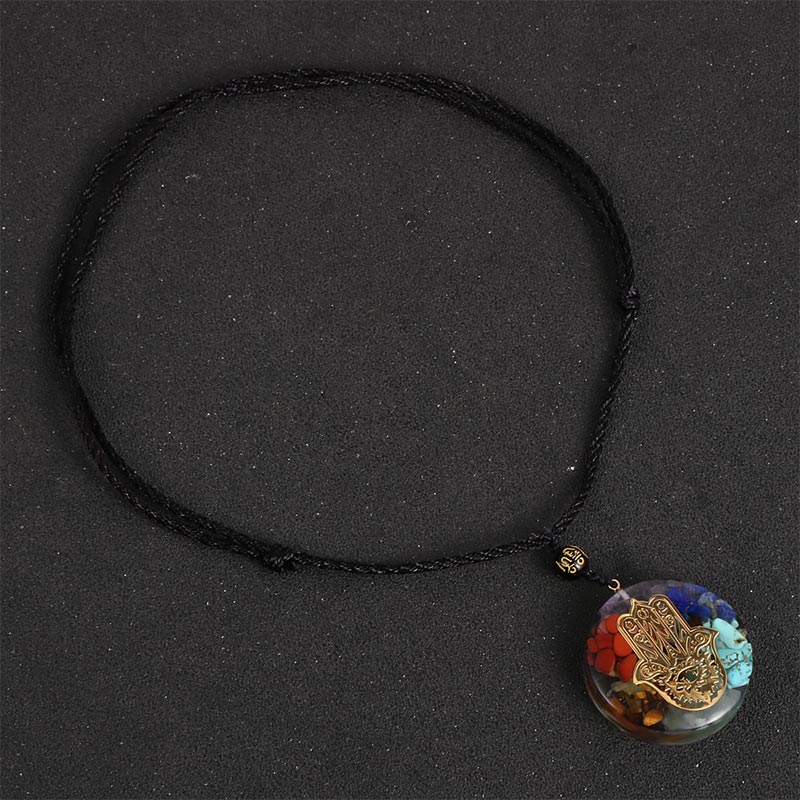 Collier symbole du mauvais œil en pierre de cristal naturel des chakras Olivenorma
