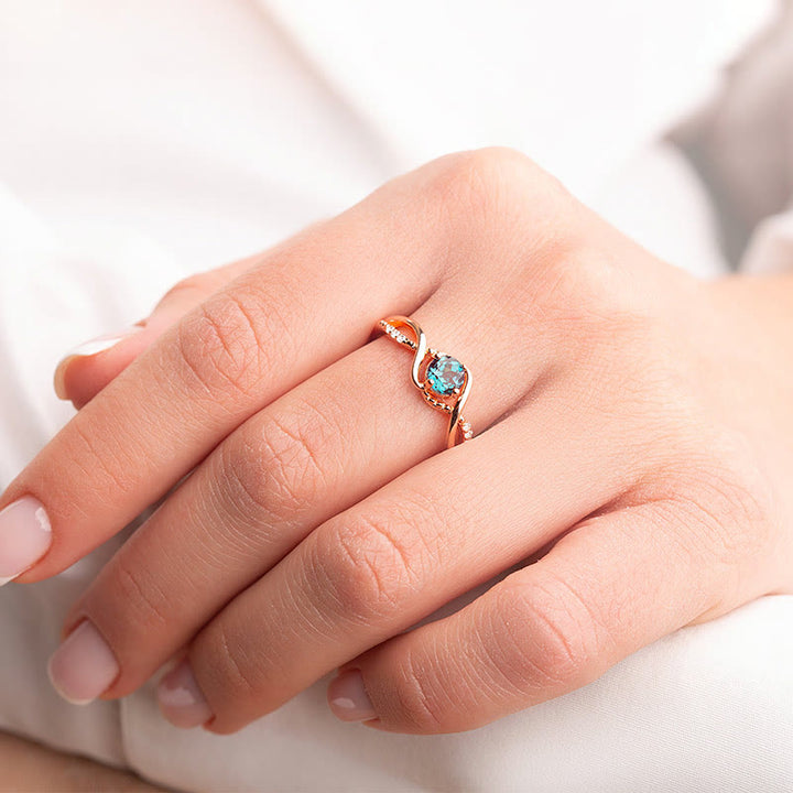 Bague de fiançailles en alexandrite bleue en forme de vague Olivenorma