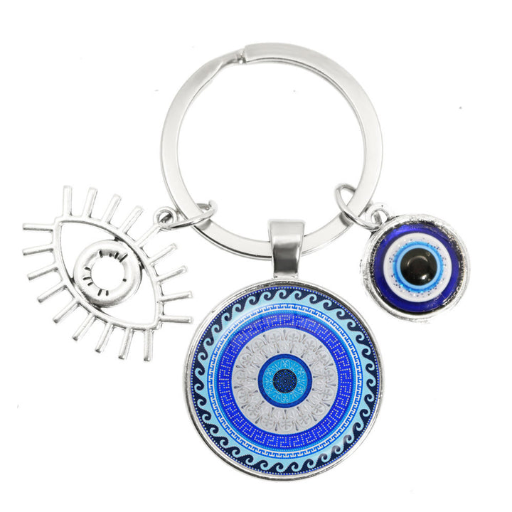 Porte-clés en époxy bleu mauvais œil Hamsa Olivenorma