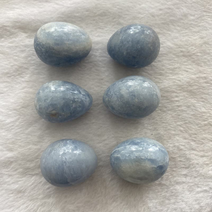 Œuf en cristal bleu aigue-marine poli Olivenorma en forme d'œuf