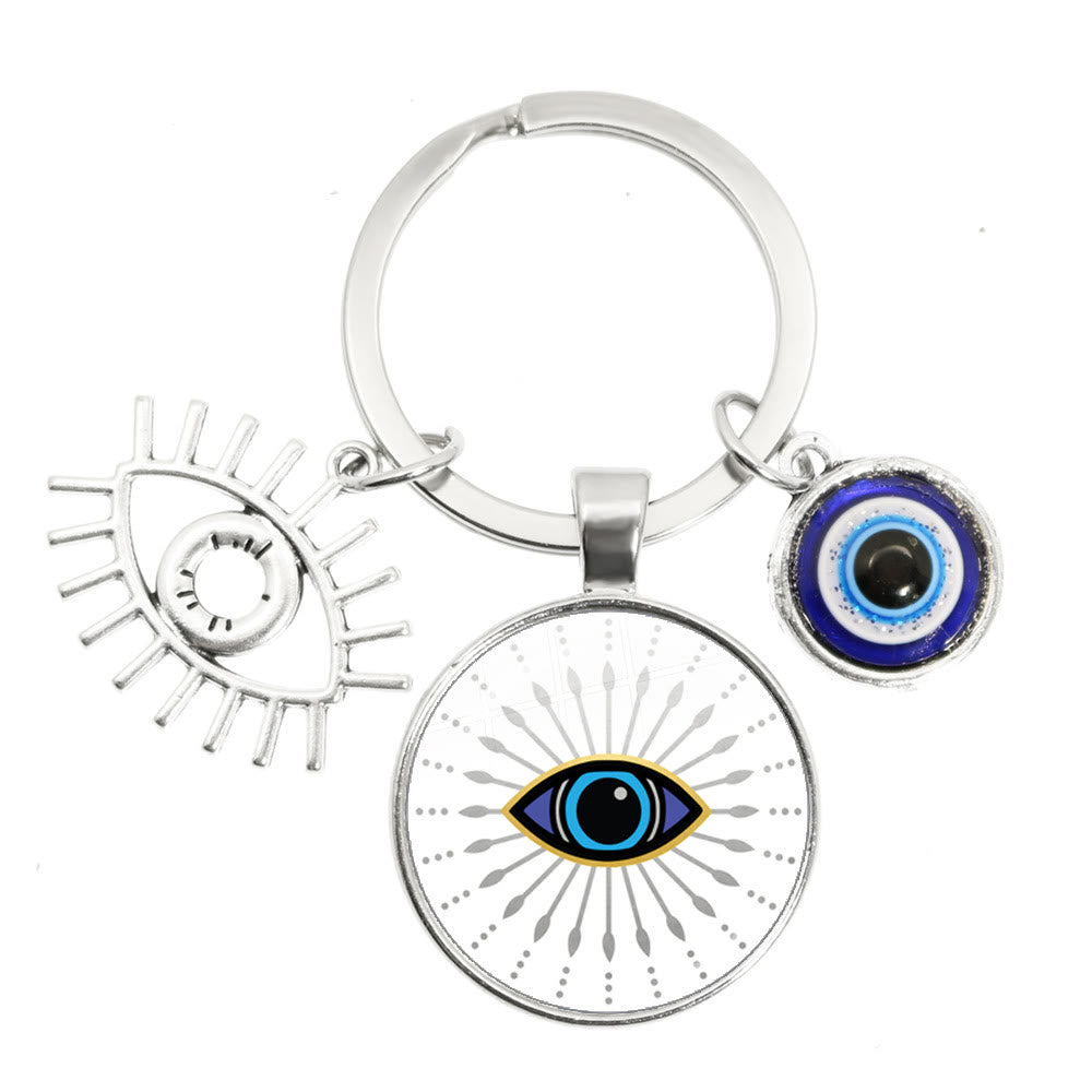 Porte-clés en époxy bleu mauvais œil Hamsa Olivenorma