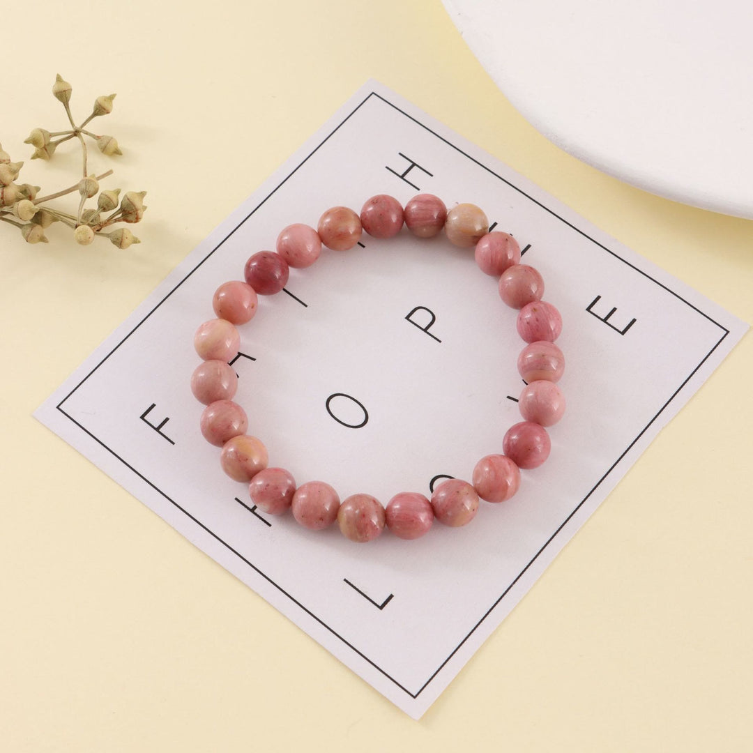 Bracelet de perles fait main en pierre zébrée rose rhodochrosite Olivenorma de 8 mm