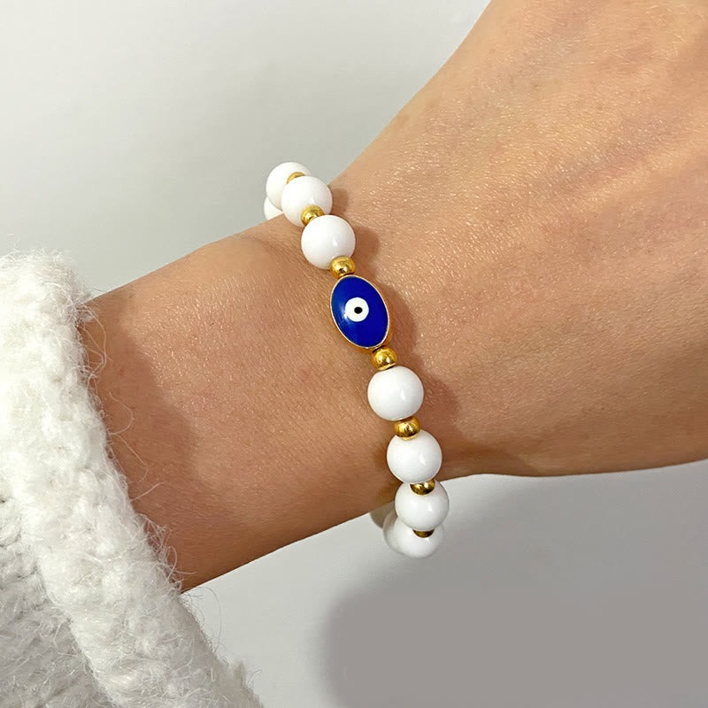 Bracelet Olivenorma 8 mm œil de tigre bleu contre le mauvais œil