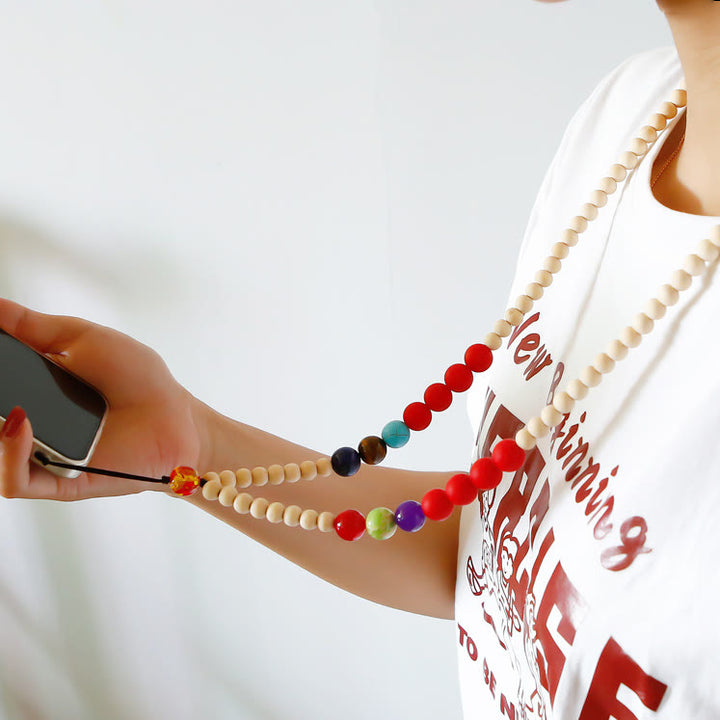 Sangle de téléphone en perles de bois faites à la main avec cordon en cristal naturel Olivenorma