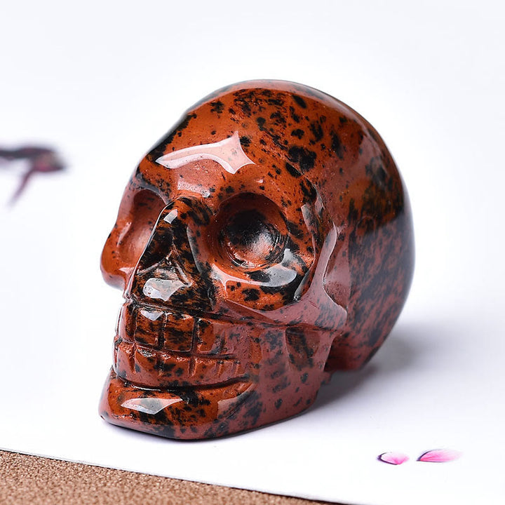Décoration artisanale en pierres précieuses avec crâne gravé en cristal Olivenorma