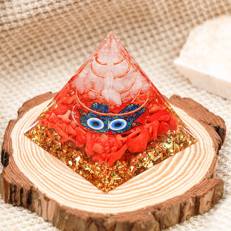 Quartz clair Olivenorma avec corail rouge Hamsa et pyramide orgone du mauvais œil