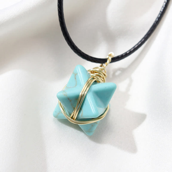 VÉHICULE DE LUMIÈRE DIVINE - Collier Merkaba en cristal