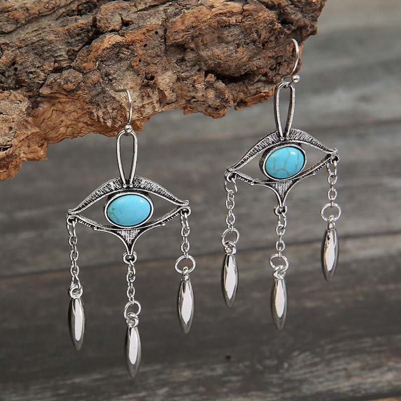 Boucles d'oreilles bohèmes en turquoise avec découpes géométriques Olivenorma