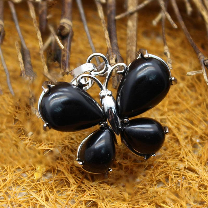 Collier papillon en cristal naturel Olivenorma