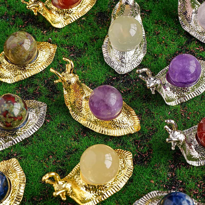 Support de boule de cristal naturel Olivenorma, petite décoration en pierre précieuse en forme d'escargot