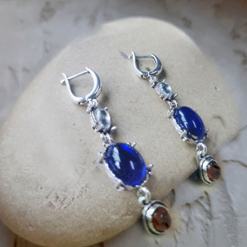 Boucles d'oreilles de sorcière ethniques en saphir et pierre de lune ovale Olivenorma