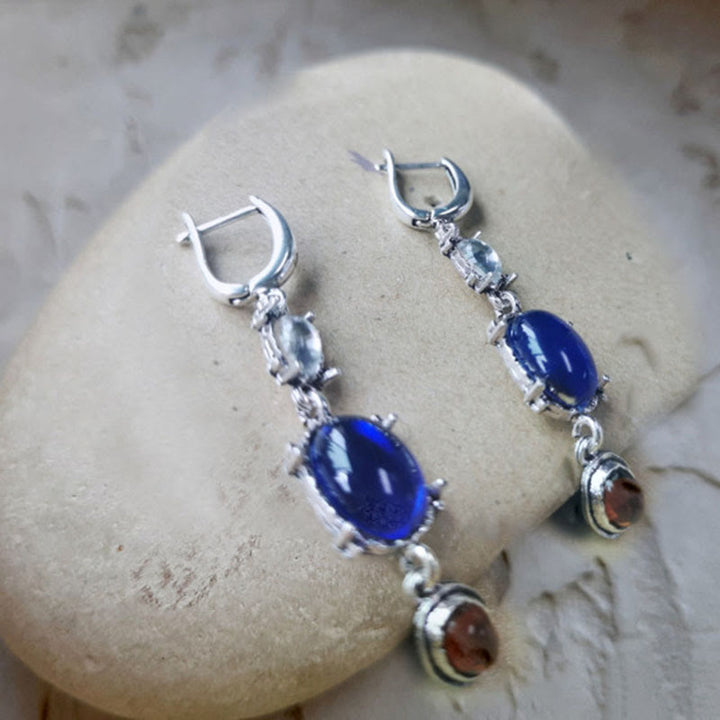 Boucles d'oreilles de sorcière ethniques en saphir et pierre de lune ovale Olivenorma