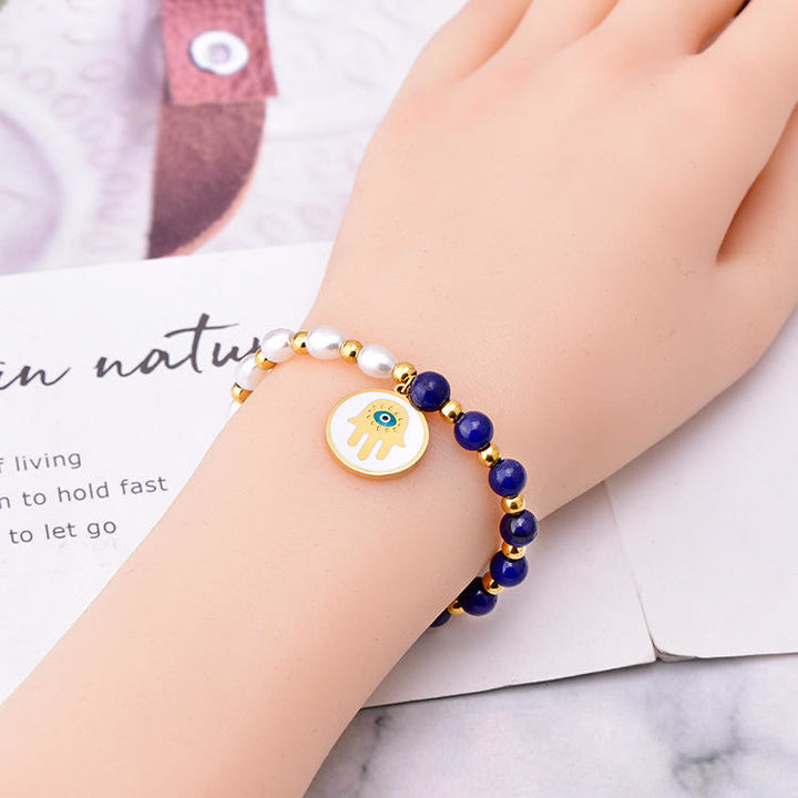 Ensemble collier, bracelet et boucles d'oreilles en perles de lapis-lazuli et turquoise Olivenorma