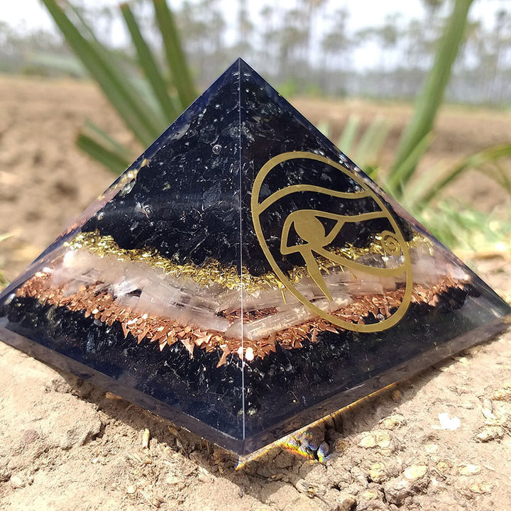 Pyramide d'orgone de protection en obsidienne Olivenorma Oeil d'Horus
