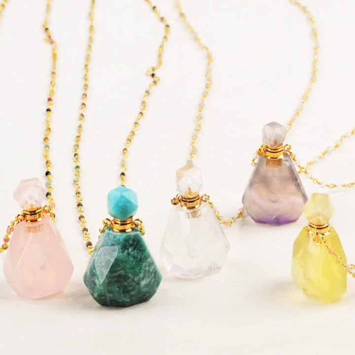 Collier bouteille de parfum en cristal