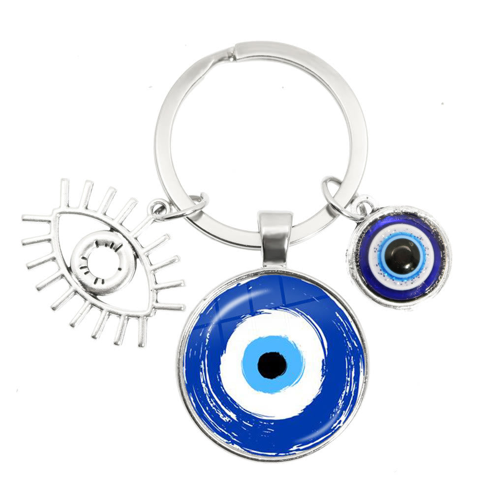 Porte-clés en époxy bleu mauvais œil Hamsa Olivenorma