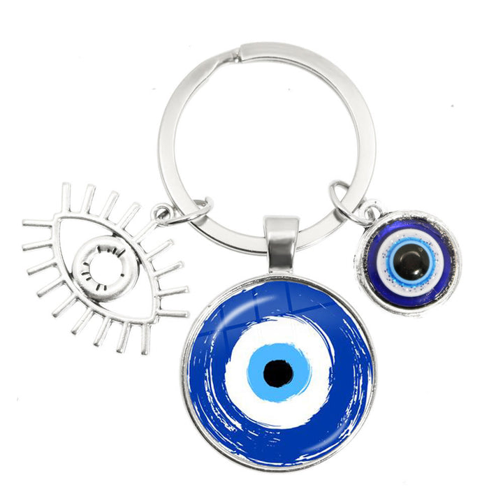 Porte-clés en époxy bleu mauvais œil Hamsa Olivenorma