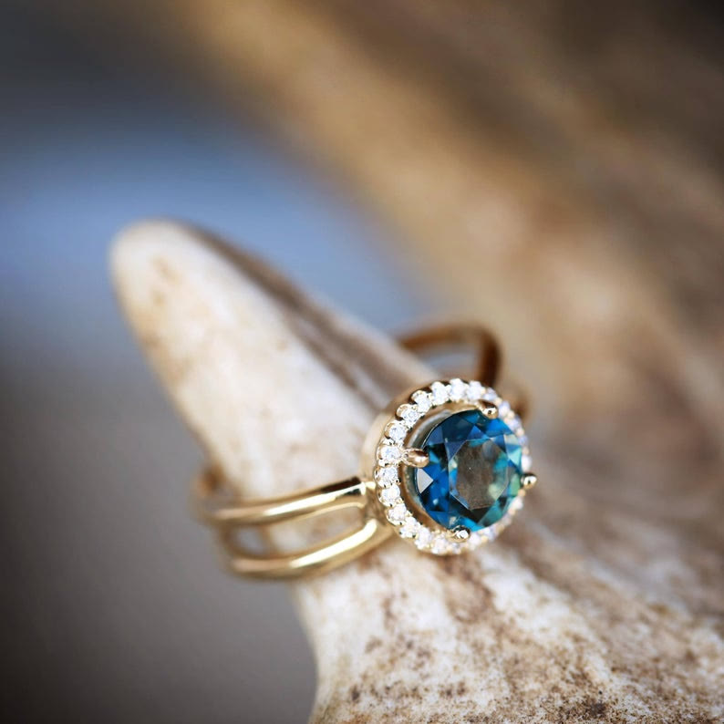 Bague de fiançailles Olivenorma « Deepen Love » avec topaze bleue taille ronde