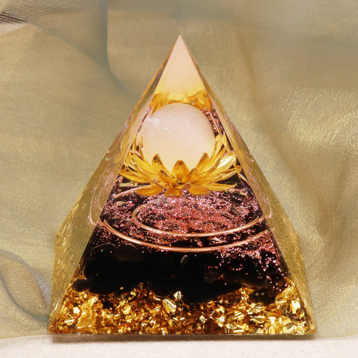 Pyramide d'orgone en cristal transparent d'obsidienne Olivenorma, symbole du lotus