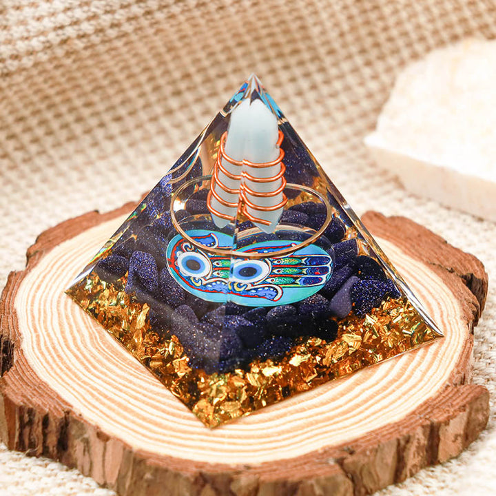 Pilier aigue-marine Olivenorma Hamsa et pyramide orgone du mauvais œil