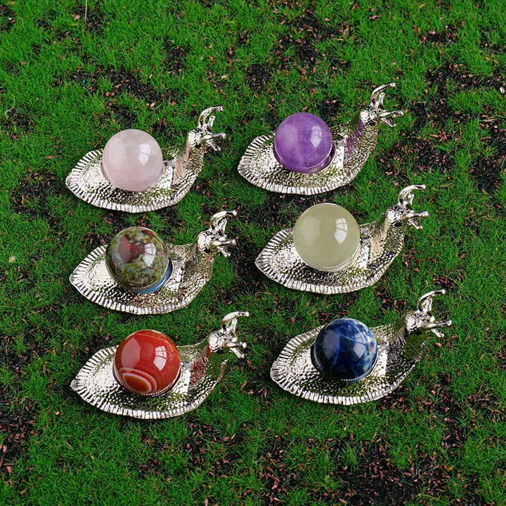 Support de boule de cristal naturel Olivenorma, petite décoration en pierre précieuse en forme d'escargot