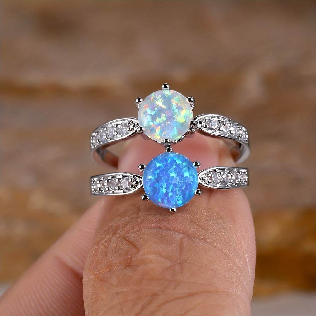 Bague à six griffes avec bordure en opale ronde Olivenorma