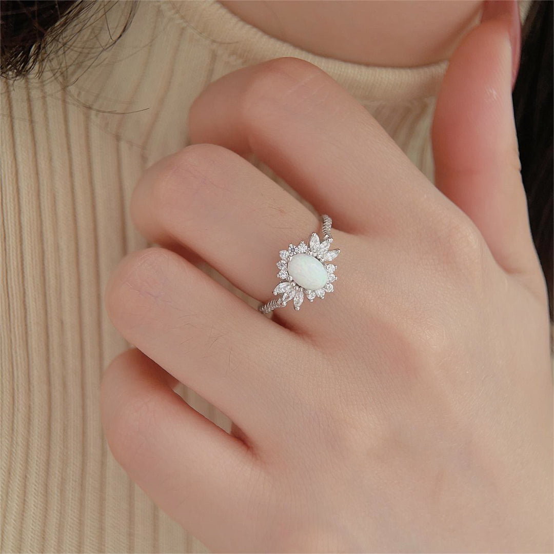 Bague en argent 925 avec motif tournesol et opale blanche et bleue Olivenorma