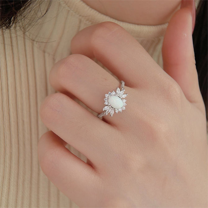 Bague en argent 925 avec motif tournesol et opale blanche et bleue Olivenorma
