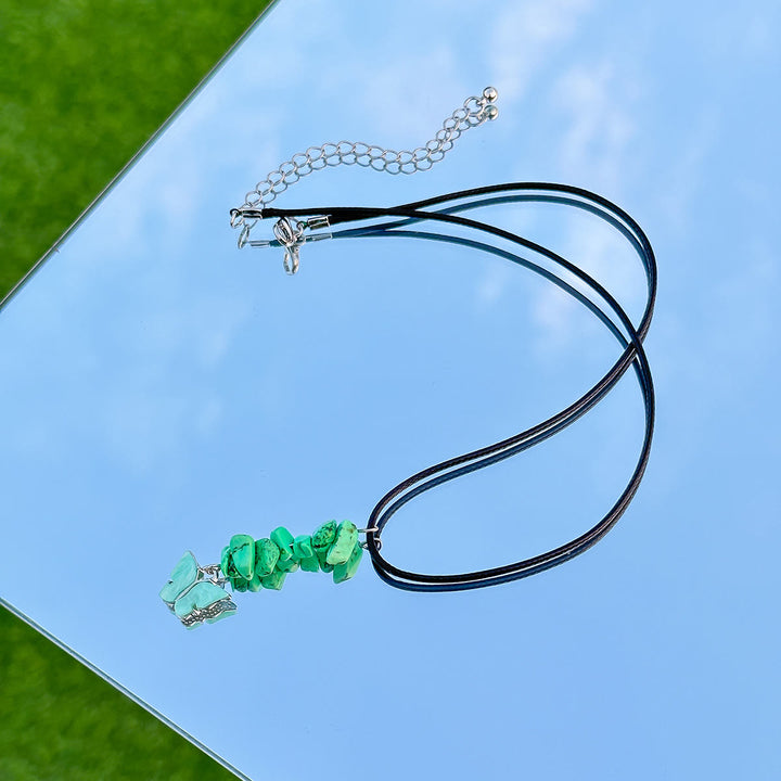 Collier en cuir et fil ciré avec pompon papillon en pierre naturelle Olivenorma