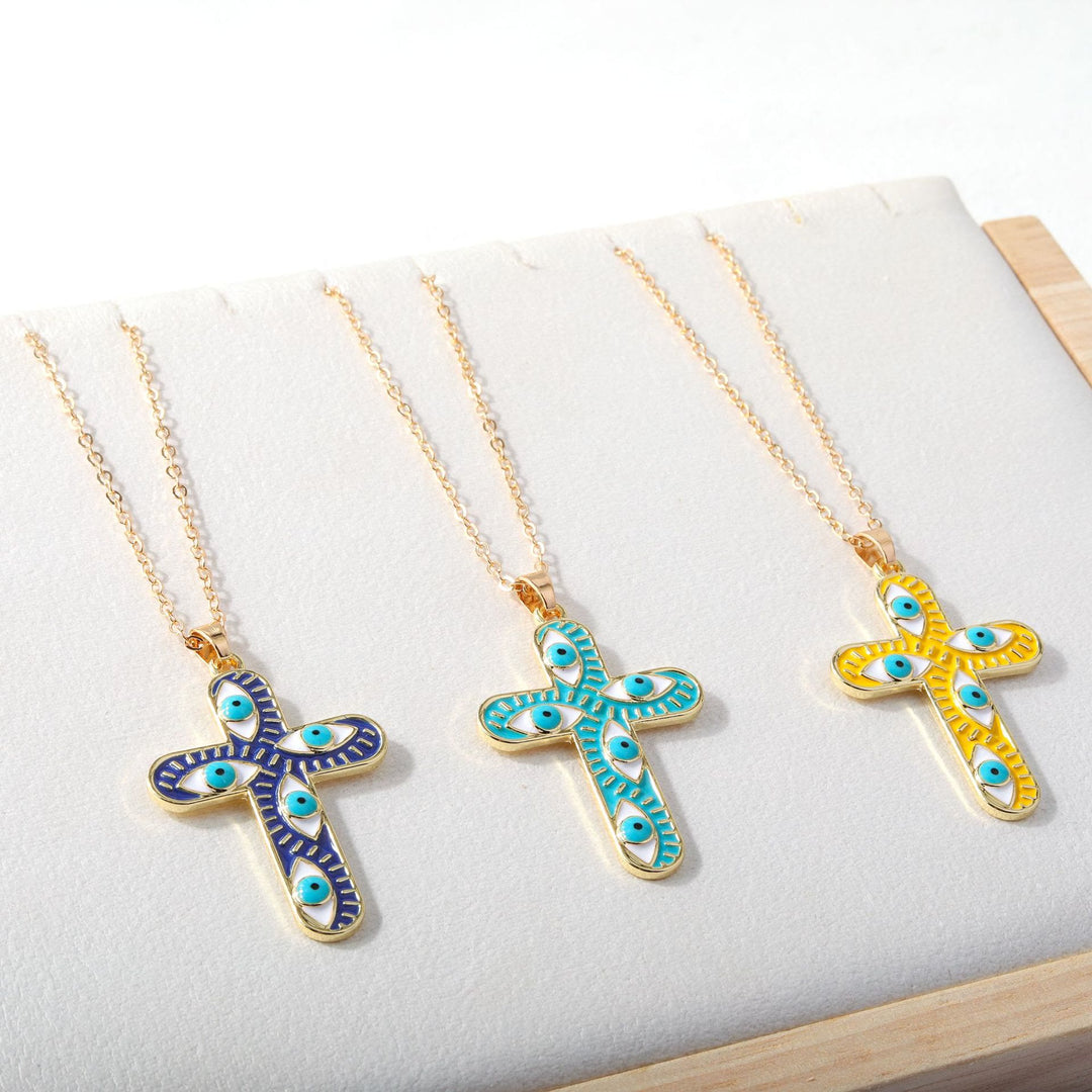 Collier Croix Mauvais Œil Olivenorma « Nous sommes protégés »