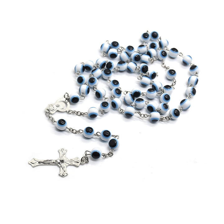 Collier chapelet avec pendentif croix contre le mauvais œil noir et blanc Olivenorma