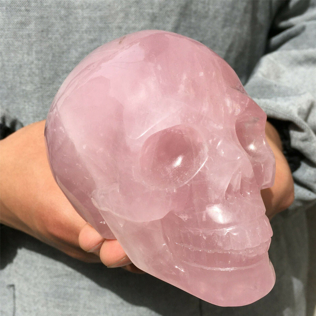 Décoration de crâne en cristal de quartz rose naturel Olivenorma