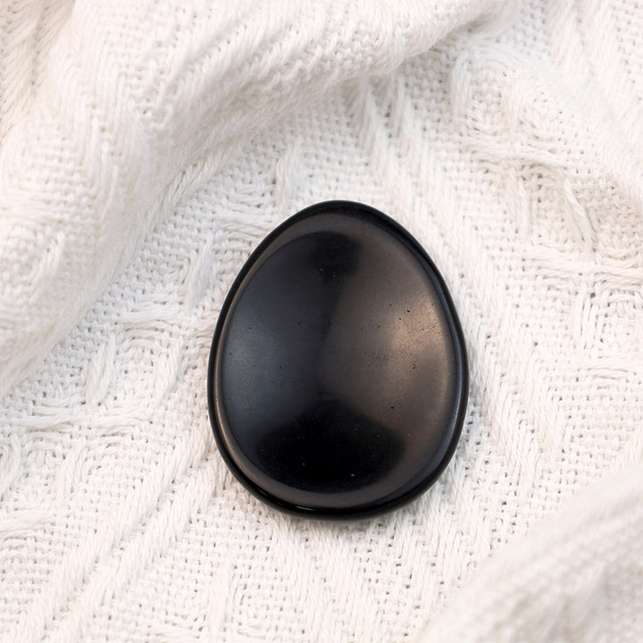 Pierre d'inquiétude pour le pouce en forme d'œuf d'onyx noir Olivenorma