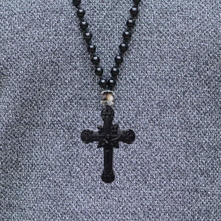 Collier symbole de croix en obsidienne Olivenorma