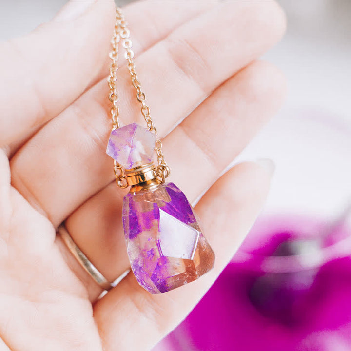 Collier bouteille de parfum en cristal