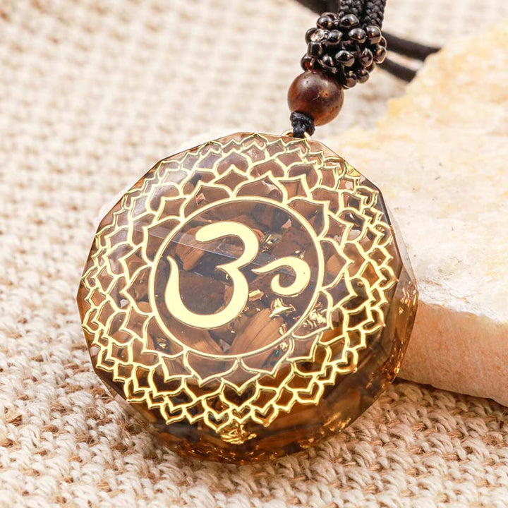 Collier de protection symbole OM œil de tigre Olivenorma