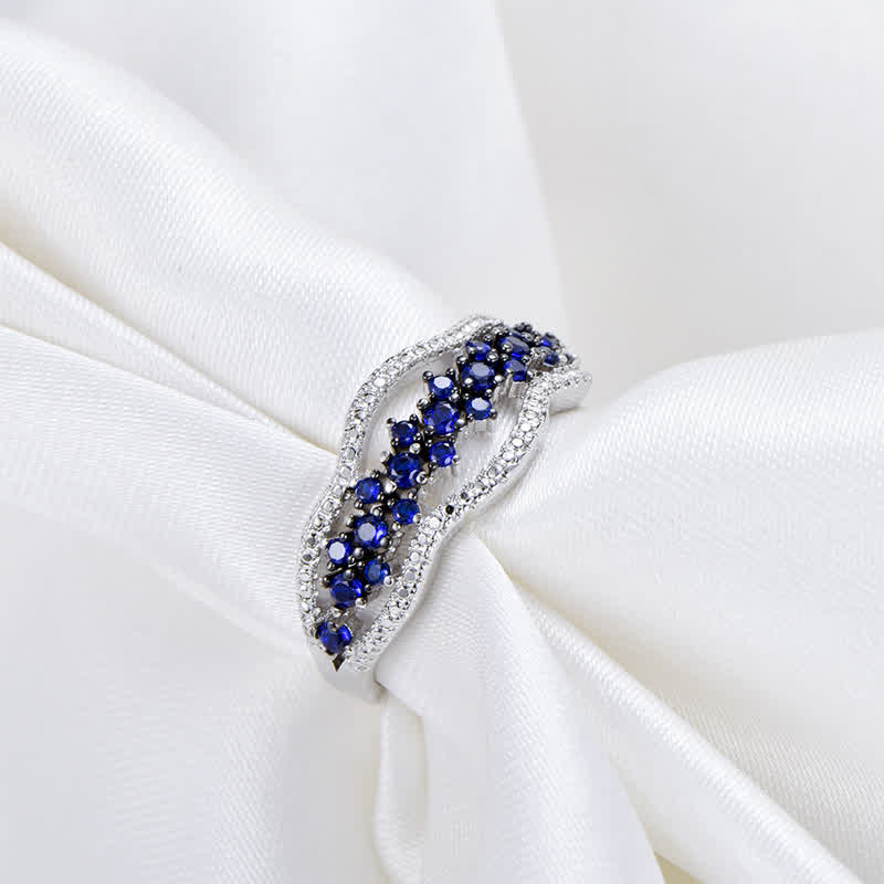 Bague créative en saphir bleu et zircon creux Olivenorma