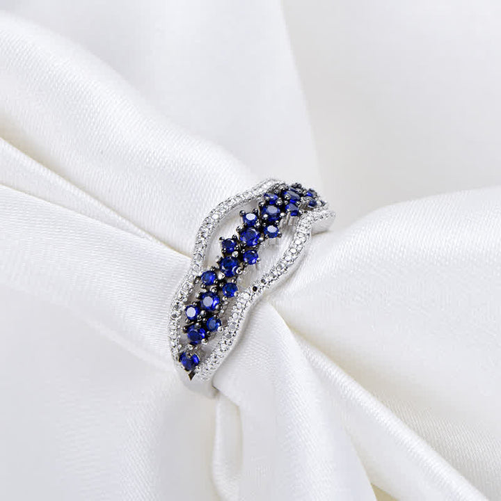 Bague créative en saphir bleu et zircon creux Olivenorma