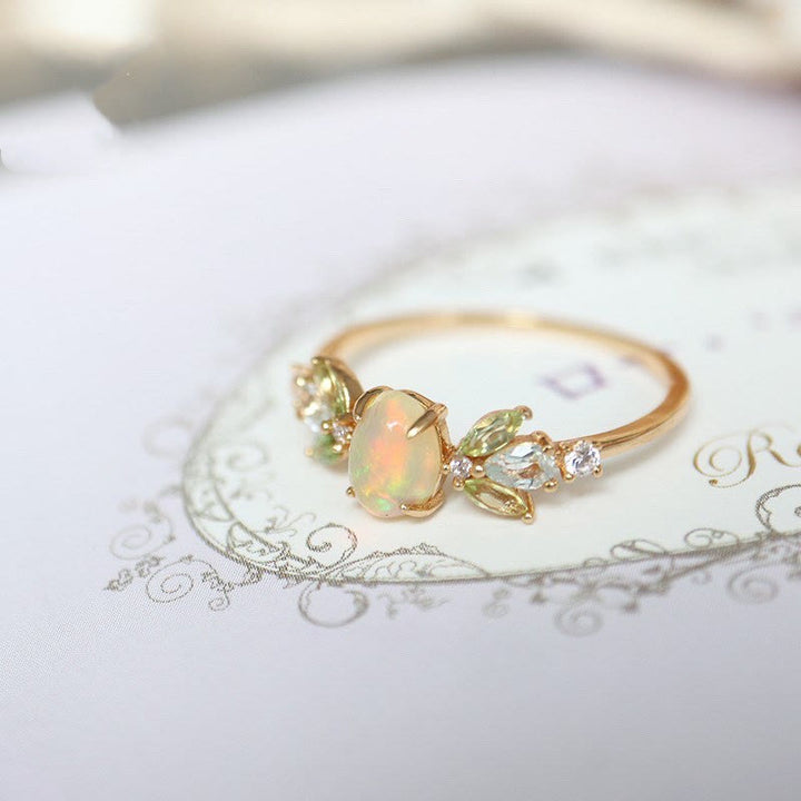 Bague en or avec feuille d'opale délicate et zircone Olivenorma