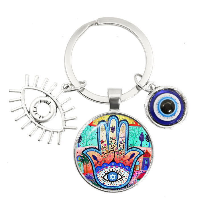 Porte-clés en époxy bleu mauvais œil Hamsa Olivenorma