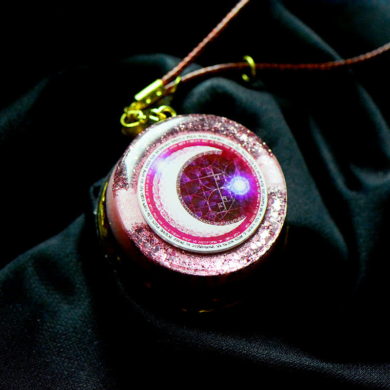 Collier Orgonite avec pendentif en phase de lune rose et banderole Moonlight Streamer Olivenorma