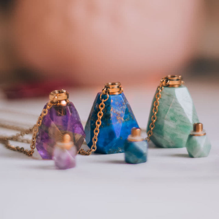 Collier bouteille de parfum en cristal