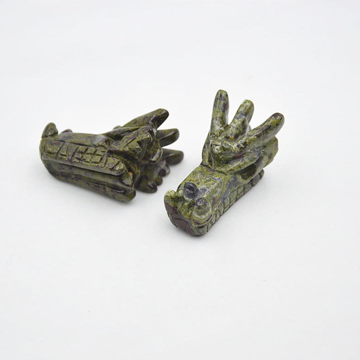 Décoration en pierres précieuses en forme de tête de dragon en cristal Olivenorma