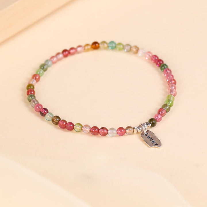 Bracelet porte-bonheur en perles de tourmaline naturelle Olivenorma de 3 cm