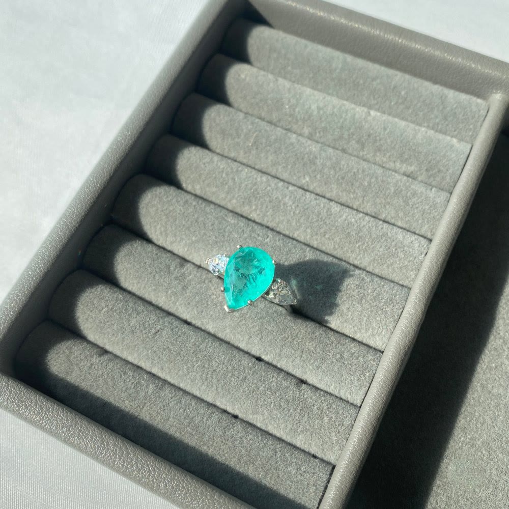 Bague exquise en zircon blanc et tourmaline Paraiba Olivenorma