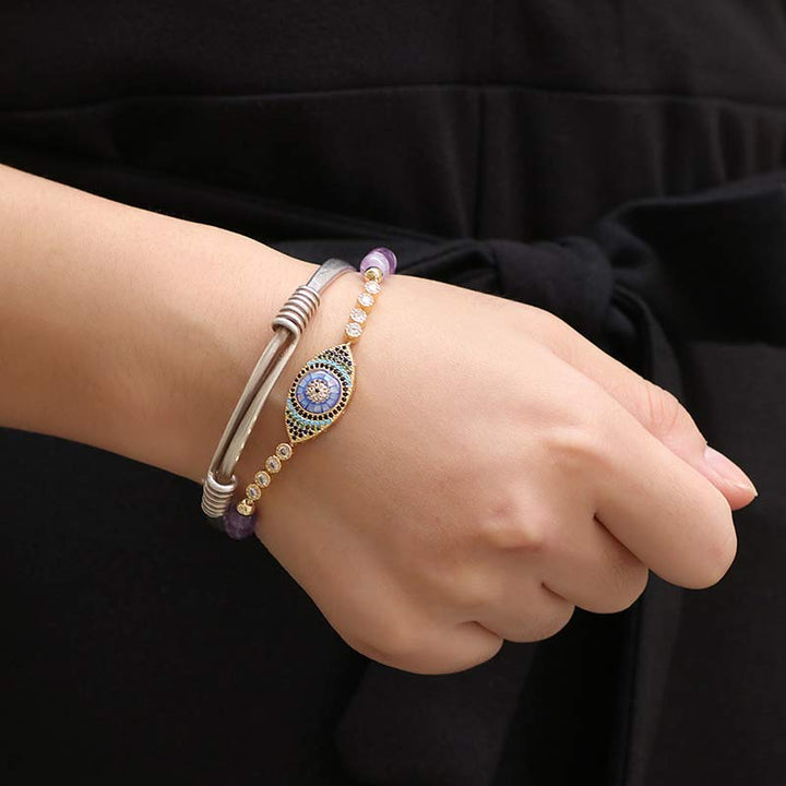 Bracelet de guérison Olivenorma avec symbole du mauvais œil en améthyste