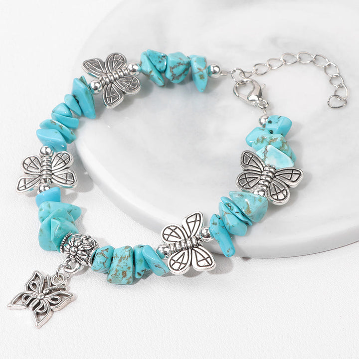 Bracelet à breloques papillon en cristal coloré Olivenorma